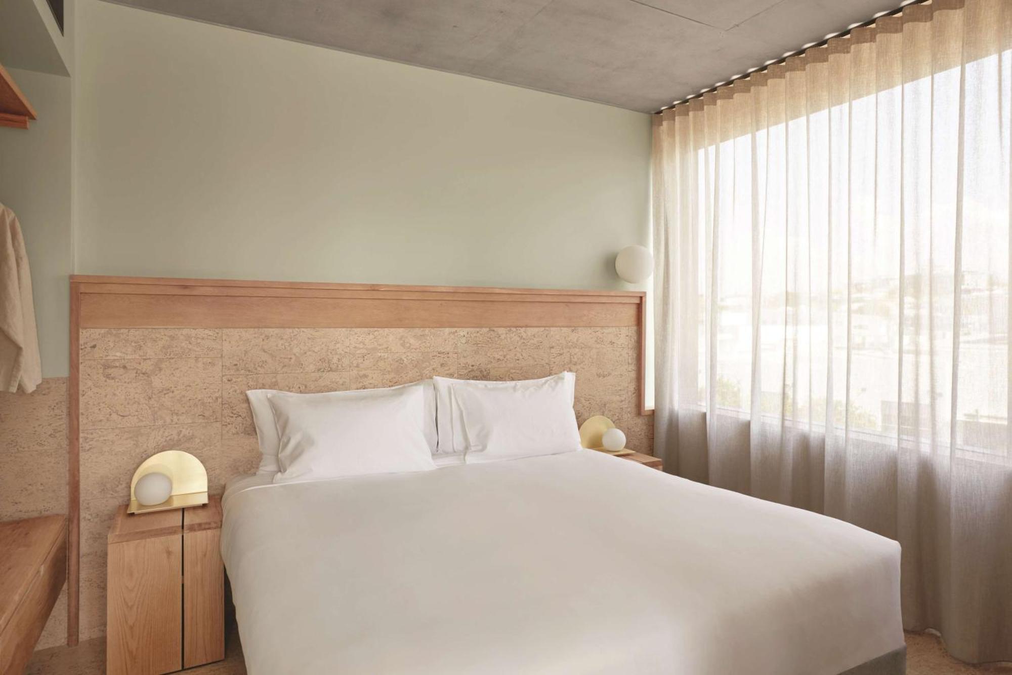 The Calile Hotel Brisbane Esterno foto A bedroom at the hotel